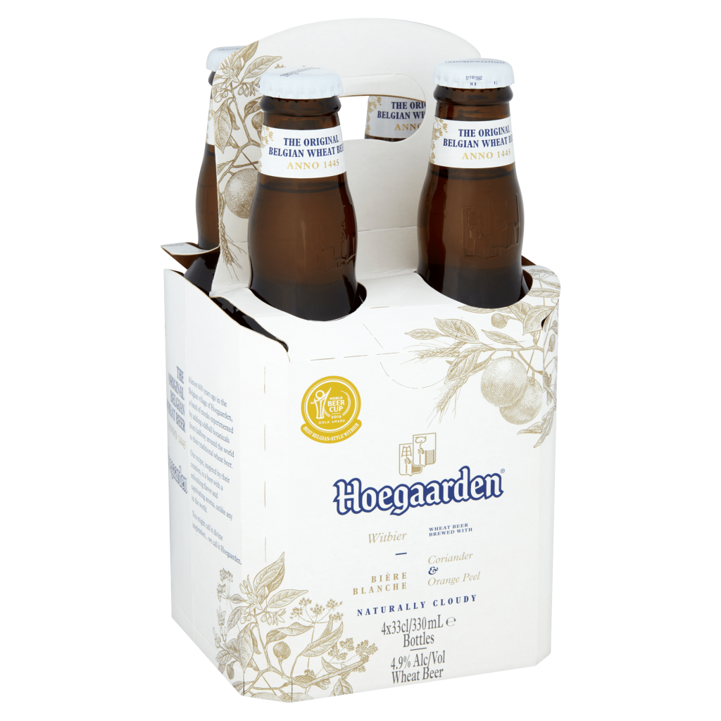 Four bottles of Hoegaarden beer in a cardboard carrier, featuring floral designs and product details.