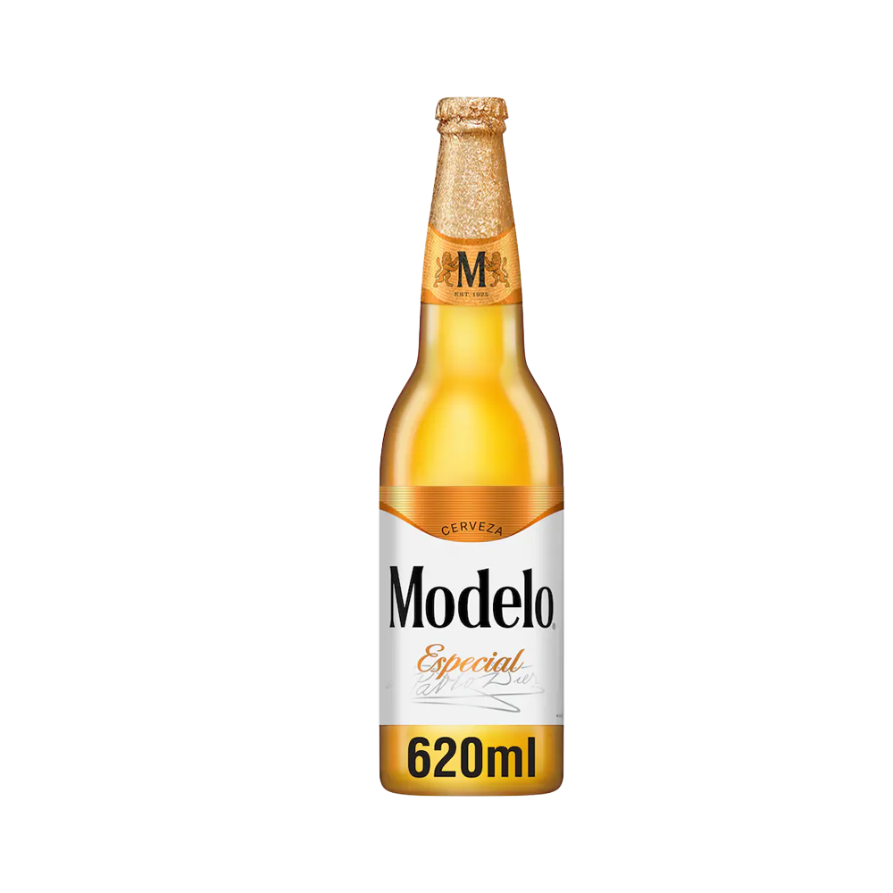 A 620ml glass bottle of Modelo beer with a gold foil-wrapped neck and a white label featuring the Modelo logo and branding.
